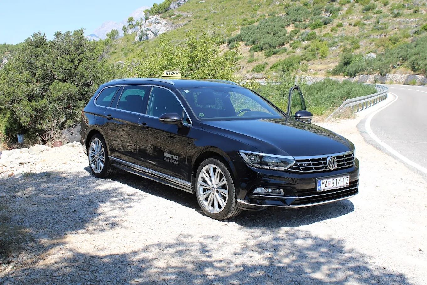 Eurotaxi Makarska vehicle parked beside a coastal road, front view